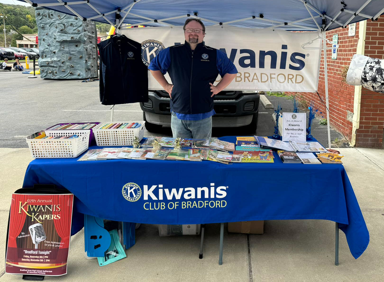 Chris Lathrop working our Free Books Table at Pumpkin Fest | Kiwanis Club of Bradford